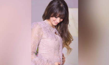 Hanna muestra su avanzado embarazo